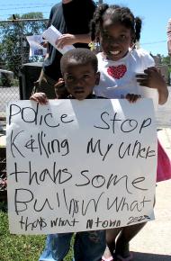 South Side residents and activists gathered to protest the fifth killing by a Chicago police officer in two weeks